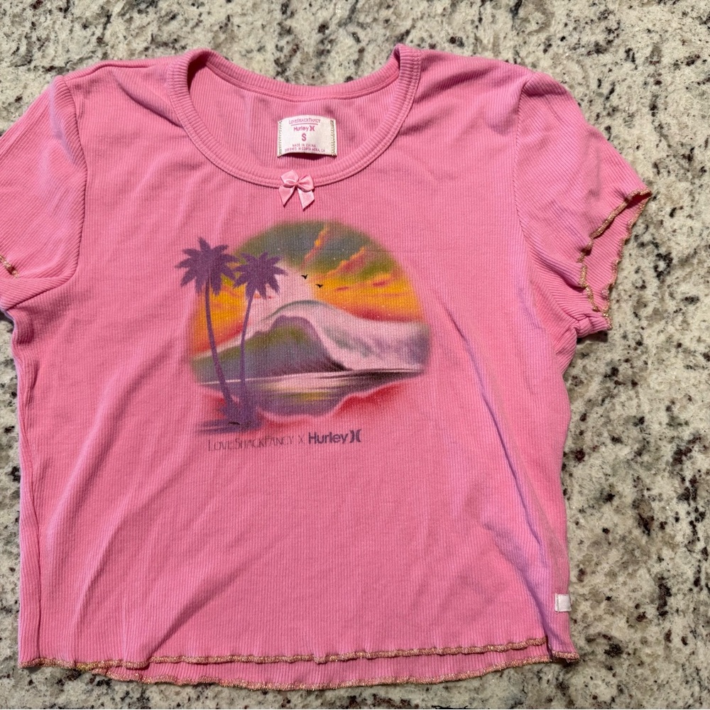 LoveShackFancy X Hurley Pink Short Sleeve Cropped Tee with Tropical Graphic